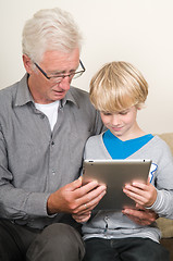 Image showing Learning to use a tablet pc