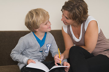 Image showing Doing homework with mother