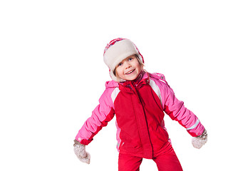 Image showing laughing girl wearing mittens with snow