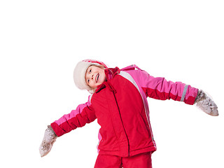 Image showing laughing girl wearing mittens with snow