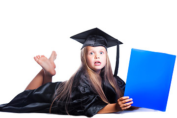 Image showing cute girl in black academic capand gown