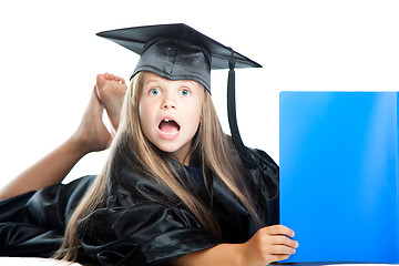 Image showing cute girl in black academic capand gown