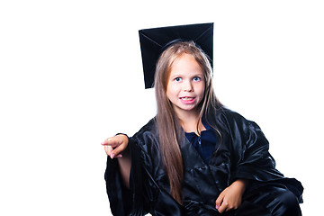 Image showing cute girl in black academic capand gown