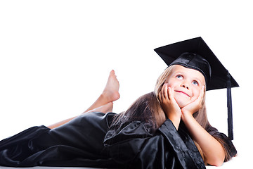 Image showing cute girl in black academic capand gown