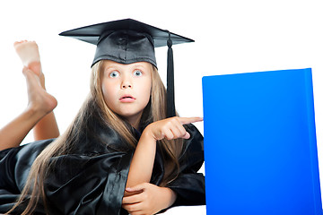 Image showing cute girl in black academic capand gown