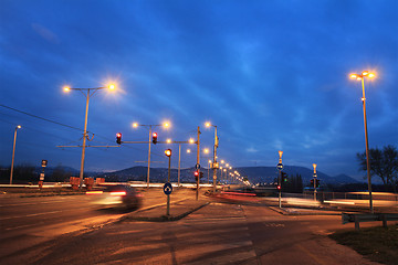 Image showing Fast moving cars at night