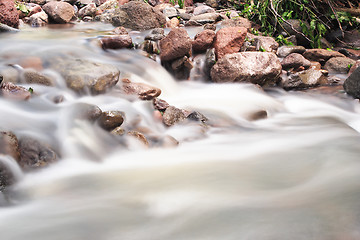 Image showing Water on the rocks into the forest