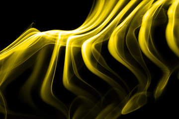 Image showing Yellow smoke in black background
