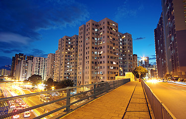 Image showing modern urban city at night with freeway traffic