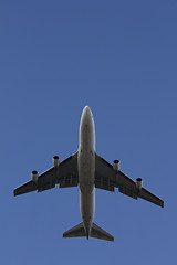 Image showing A commercial airplane flying over