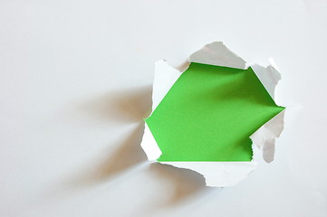 Image showing green hole in blank sheet paper