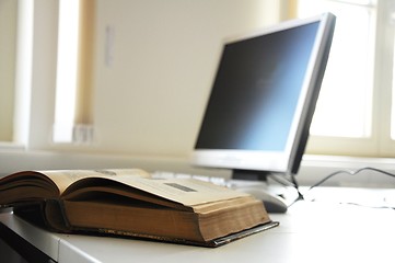 Image showing books and computer