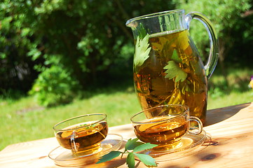 Image showing cup tea in the garden