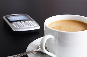 Image showing cup of coffee in the office