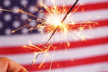 Image showing sparkler and usa flag