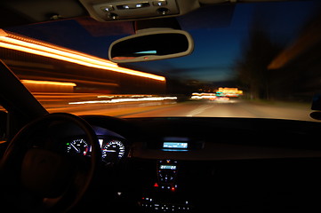 Image showing night drive with car in motion 