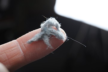 Image showing dust and finger