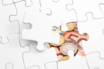 Image showing puzzle and money