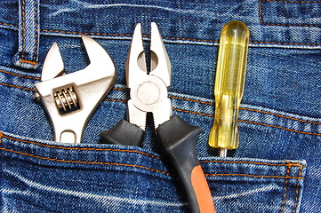 Image showing tools and jeans