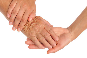 Image showing Hands of young and senior women - helping hand concept - clipping path included