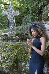 Image showing Young woman praying