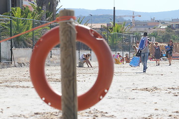 Image showing life buoy on beach