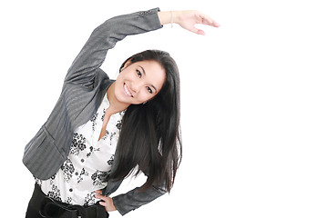 Image showing business woman portrait stretching isolated over a white backgro