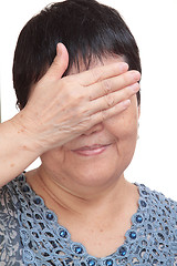 Image showing asia woman blinding her eyes by hand