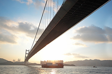 Image showing long bridge in sunset hour