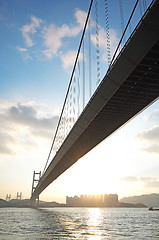 Image showing long bridge in sunset hour