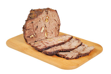 Image showing Roast beef on a wooden board