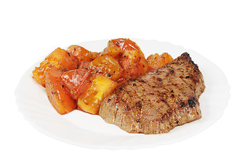 Image showing Plate with a beef steak and roasted tomatoes