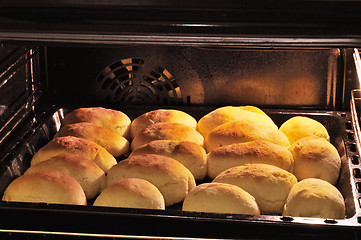 Image showing Buns on a baking sheet in oven