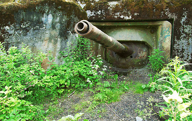 Image showing Old abandoned military pillbox with a tank cannon.