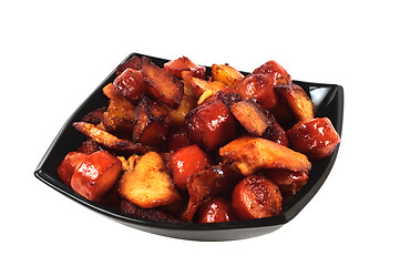Image showing Dish with grilled sausages, meat and potatoes.