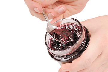 Image showing Canned jam and spoon