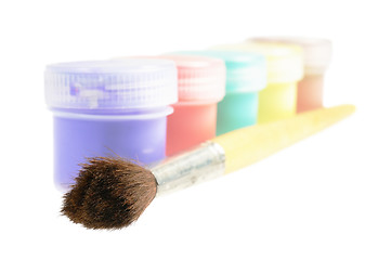 Image showing Five cans  of paint and brush