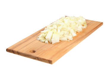 Image showing Chopped onions on a wooden board