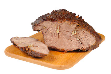 Image showing Roast beef on a wooden board