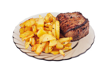 Image showing Grilled meat and  fried  potatoes  on a plate