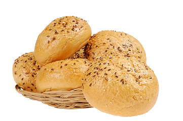 Image showing Bun, topped with sesame seeds in a basket