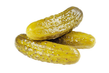 Image showing Three pickled  cucumbers.  Gherkins.