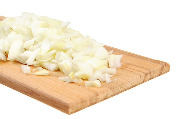 Image showing Chopped onions on a wooden board