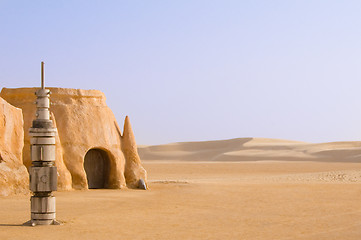 Image showing Tataouine scenery on a background of sand dunes.