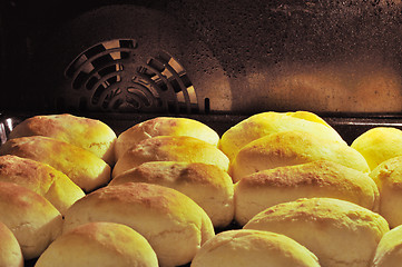 Image showing Buns on a baking sheet in oven