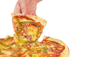 Image showing Pizza and slice of pizza in hand