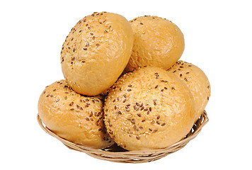 Image showing Bun, topped with sesame seeds in a basket