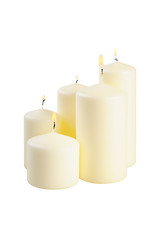 Image showing Five large lighted candle