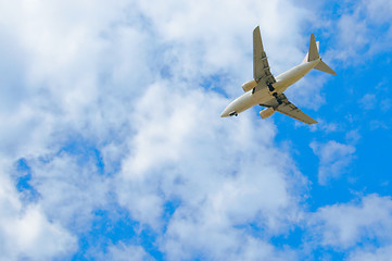 Image showing Passenger plane in the blue sky