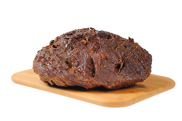 Image showing Roast beef on a wooden board